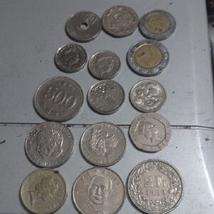 Diverse Coin Collection with Silver (.63 Oz)